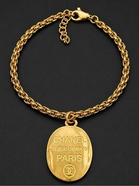Chanel EUC CC Paris gold tone 
Hammered logo Bracelet 
7” Cuban stainless Chain